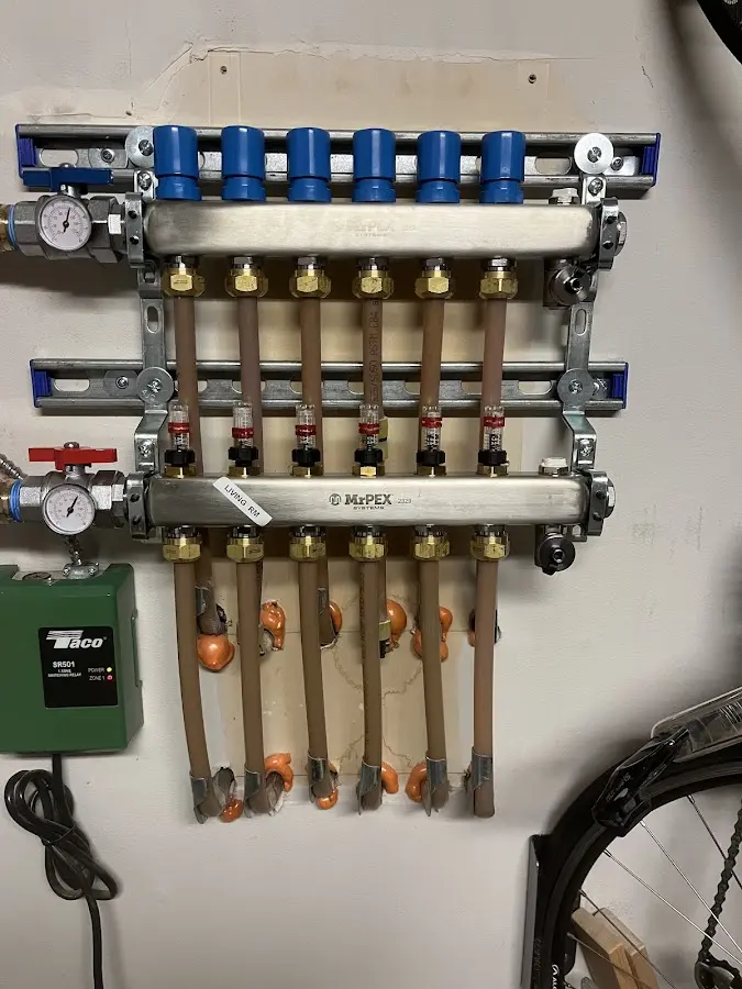 Plumber performing Gas Line Installation at a residential property in Somerville